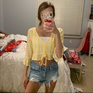 yellow and white top